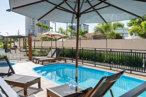 Apartamentos em Bal Piçarras 150 M DA PRAIA com Sacada Wi Fi, Piscina, Portaria 24h, Playground e vaga de GARAGEM