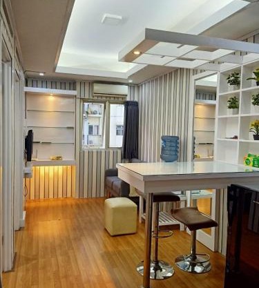 Apartement The Suites Metro by Pinkish
