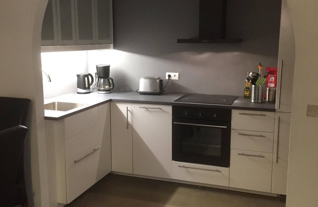 Apartm. in a family house with 2 bedr. and a living room with 2 beds