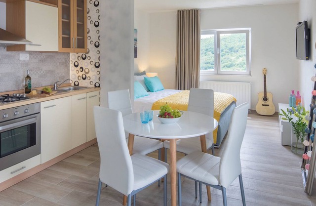 Apartman Emma *** with terrace and sunbeds