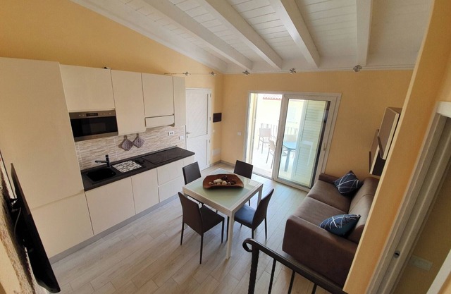Apartment 'Caprera' with Private Terrace, Wi-Fi and Air Conditioning