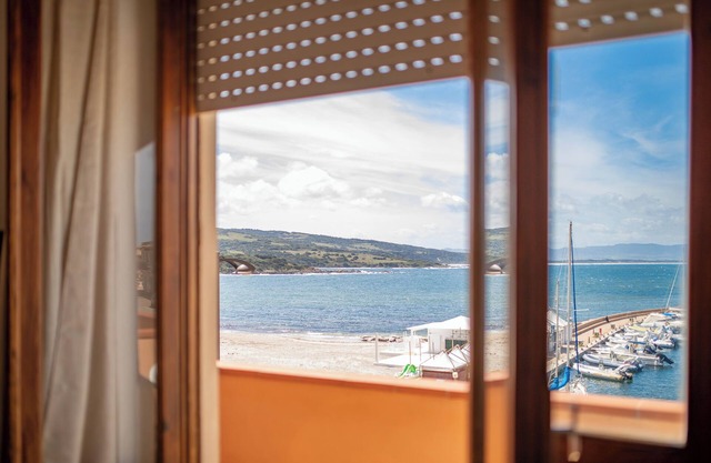 Apartment "Casa Spiaggia Molo 4" on Isola Rossa with Sea view & Balcony