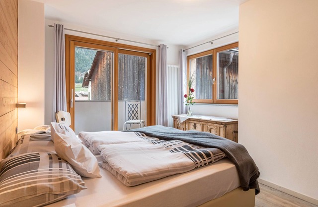 Apartment 'Ciasa Majonade Pozza Di Fassa Tipo2' with Mountain View, Shared Garden and Wi-Fi