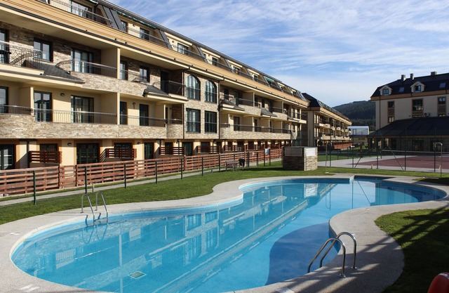 Apartment Costa Reinante Spa Beach Las Catedrales. Urbanization with spa.