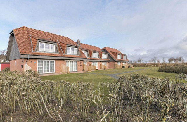 Apartment 'Nordseeperle' with Private Terrace and Shared Garden