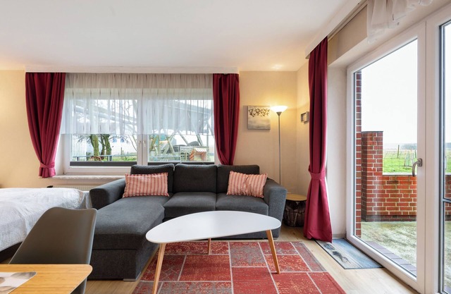 Apartment 'Deichblick 3' with Shared Garden and Balcony