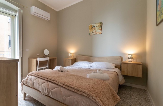 Apartment 'Dormiamoci Sù' with Balcony, Wi-Fi and Air Conditioning