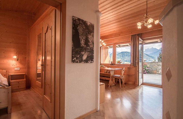 Apartment for 2-4 people with a large terrace and sauna as well as a tiled stove