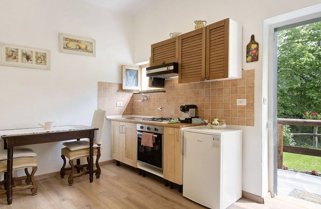 Apartment 'Green Riviera - Giardino' with Mountain View, Shared Pool & Wi-Fi