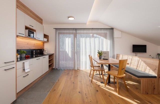 Apartment 'Huberhof Enzian' with Mountain View, Private Terrace and Wi-Fi