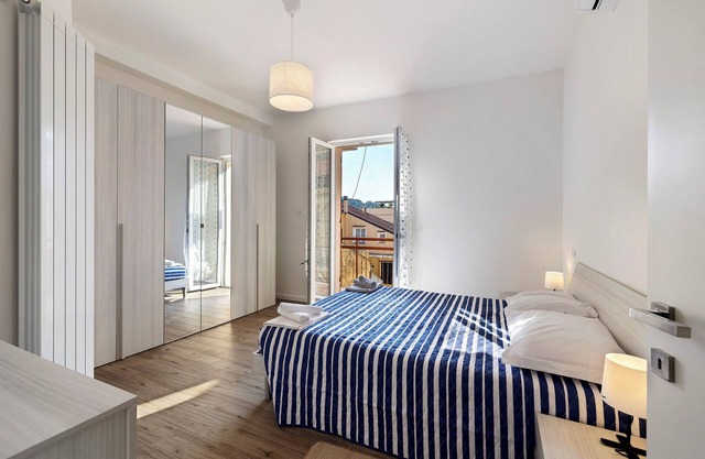 Apartment 'Il Borgo Incantato con garage' with Wi-Fi and Air Conditioning