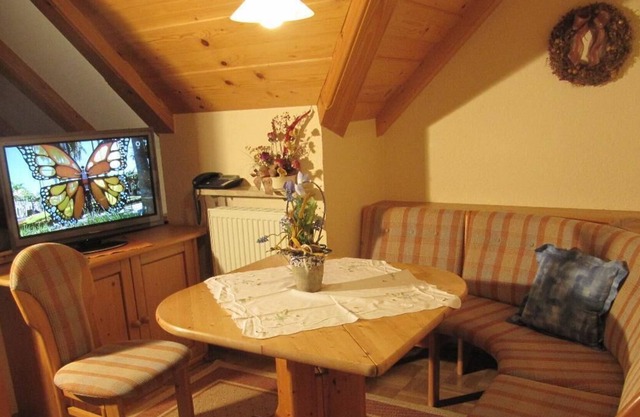 Apartment in the attic (34 sqm) with a large garden and barbecue facilities