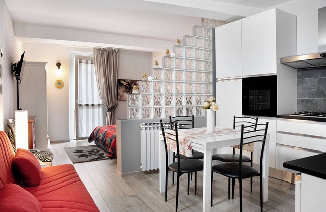 Apartment 'Incantevole Loft Red Passion' with Balcony, Wi-Fi and Air Conditioning