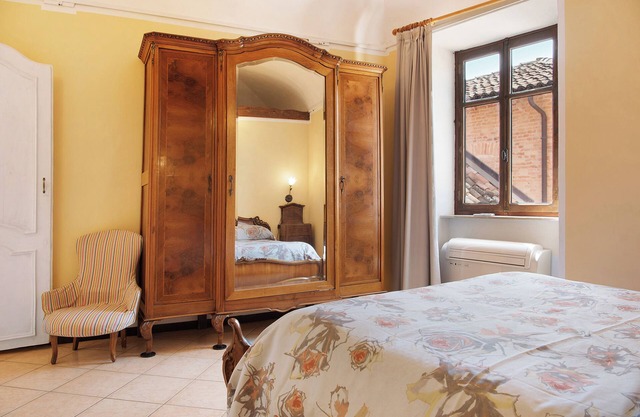 Apartment 'La Rocca di Efisio - Grignolino' with Balcony, Wi-Fi and Air Conditioning