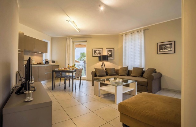 Apartment 'La Villa Tesoro' with Lake View, Shared Pool and Wi-Fi