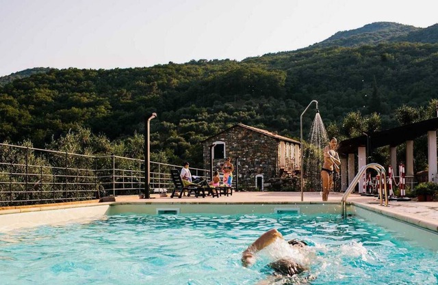Apartment "Monolocale Luna" with mountain view, swimming pool, Wi-Fi, A/C, terrace & garden