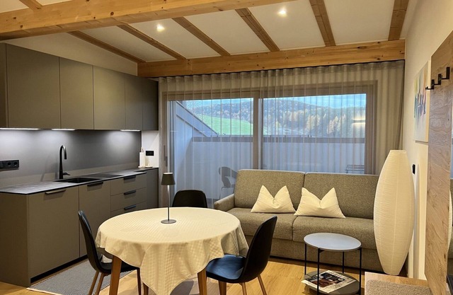 Apartment 'Mountain Stay Sunrise' with Mountain View, Shared Garden and Wi-Fi