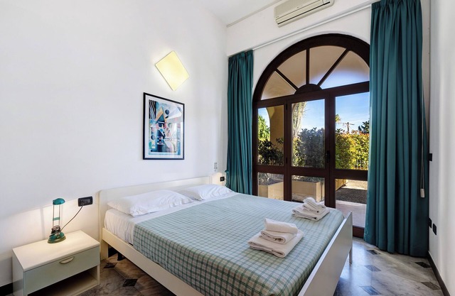 Apartment 'Pian Dei Boschi B3210' with Shared Pool, Wi-Fi and Air Conditioning