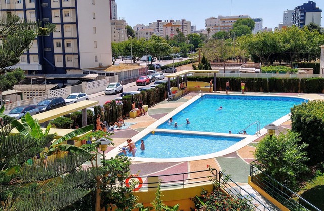 Apartment Playa Gandia-pool-air conditioning-Internet 100Mb-Only Families