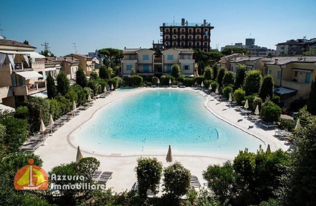 Apartment 'Residence Borgo Dei Fiori A06' with Shared Pool and Private Terrace