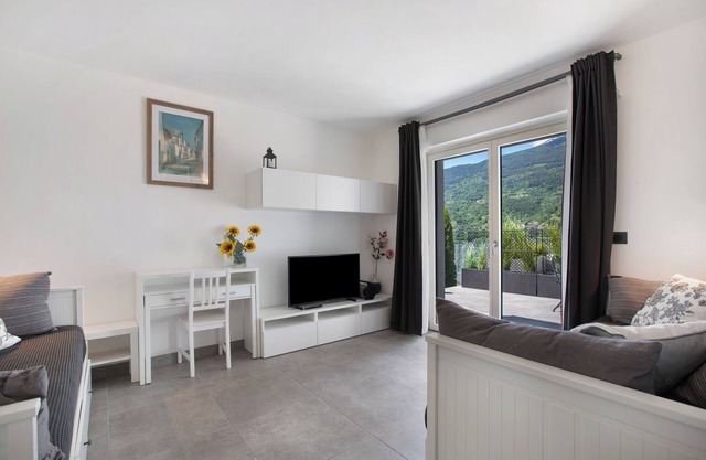 Apartment 'Residence Soleluna - Orsa Minore' with Mountain View, Shared Terrace and Wi-Fi