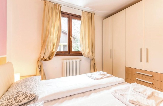 Apartment 'Rosa delle Dolomiti Bilocale1' with Mountain View & Shared Sauna