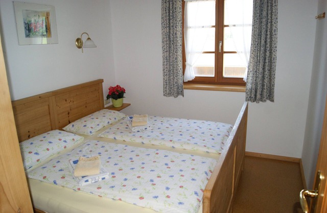 Apartment up to 4 people- Kampenwand- 65 sqm, 2 bedrooms, kitchen, satellite TV, balcony, own entrance, non-smoking