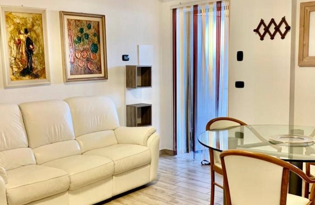 Apartment 'Villetta A Schiera 29 - Art Village' with Private Terrace, Wi-Fi and Air Conditioning