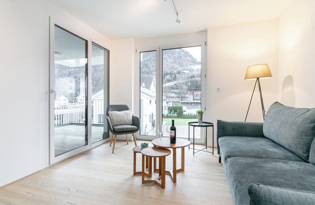 Apartment with a terrace surrounded by mountains