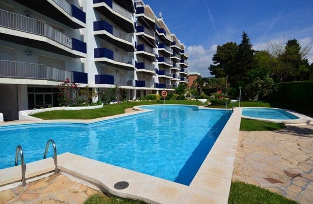 Apartment with communal pool and playground
