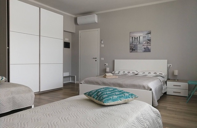 APARTMENT WITH BALCONY AND PRIVATE GARDEN IN A TWO-FAMILY VILLA