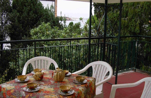 Apartment with panoramic terrace in villa with garden