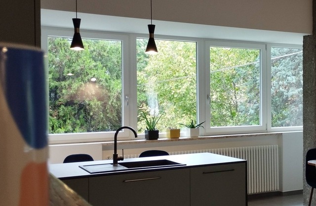 Apartment with kitchen-living room, 3 bedrooms, 2 bathrooms, laundry.
