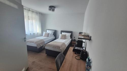 Apartments Seibel Doppel-Zweibettzimmer mit Bad