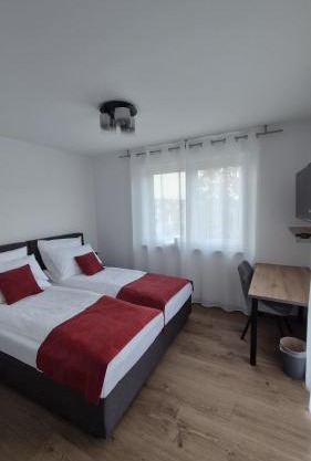 Apartments Seibel Doppel-Zweibettzimmer mit Balkon