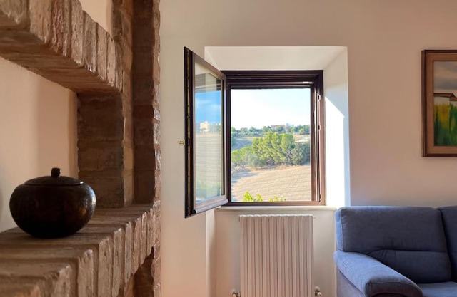 [Appartamento con vista] Finestra sulle colline