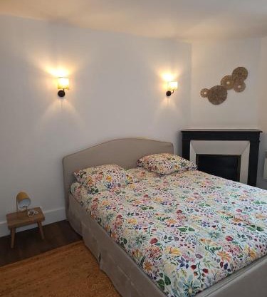 Appartement Refait a neuf avec accès au jardin , local vélo