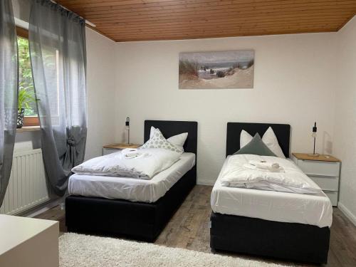 Appartio - Gästehaus "Dorfblick" - komfortable Ferienwohnungen mit Küche und Waschmaschine