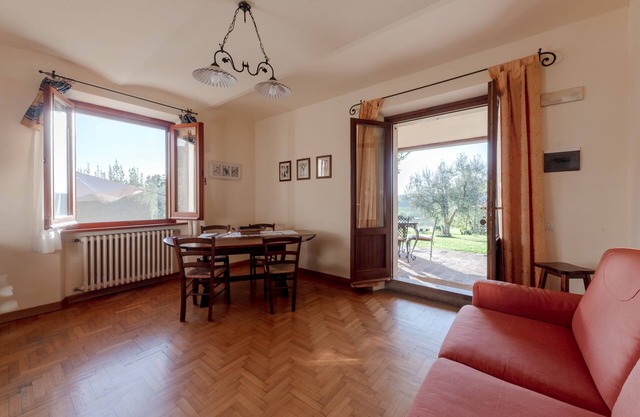 Apt. Pino with private garden, pool view and wonderful panorama.