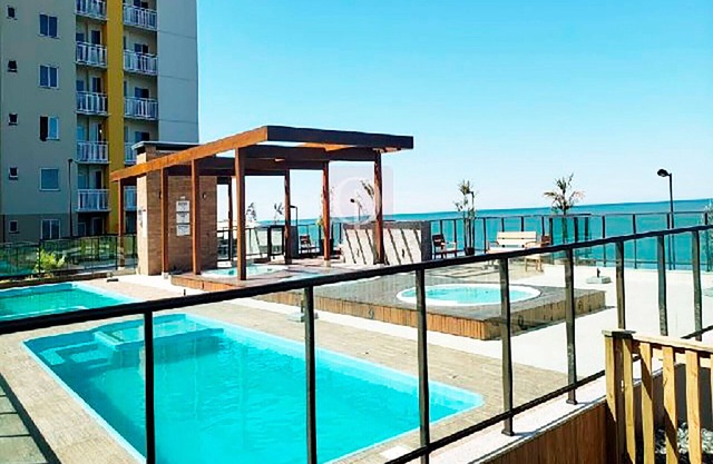 Apto c churrasq e piscina a beira-mar - Itajuba-SC