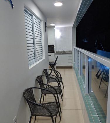 Apto completo com varanda gourmet a 50 mt da praia