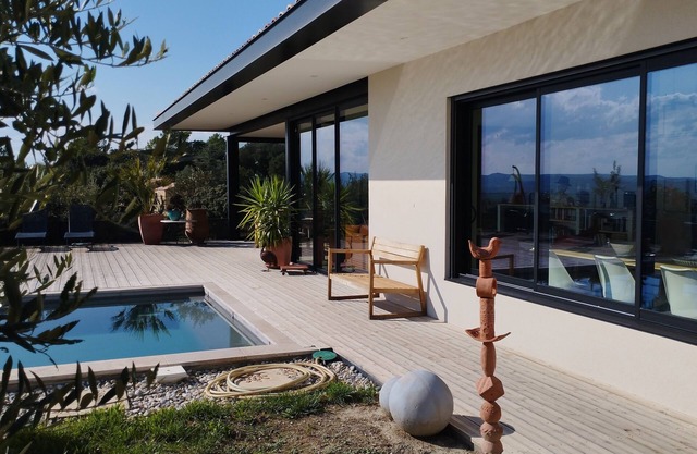 Architect-designed house in a subdivision with views and a swimming pool not overlooked