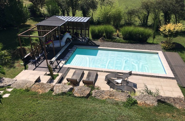 Architect house with terraces and outdoor swimming pool near medieval village