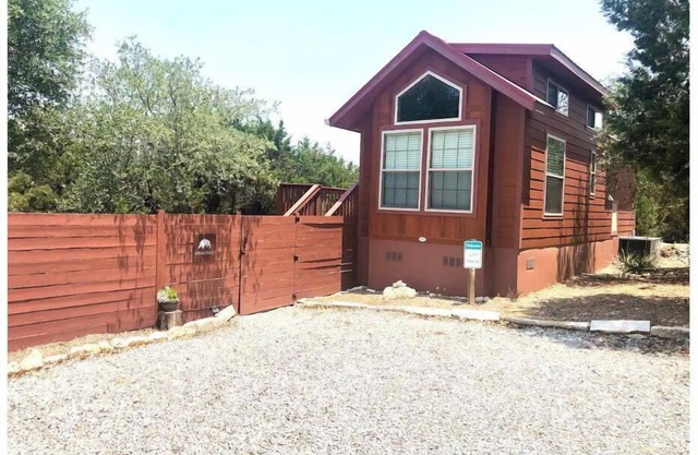 Armadillo cabin in a boutique gated tiny home resort with pool!