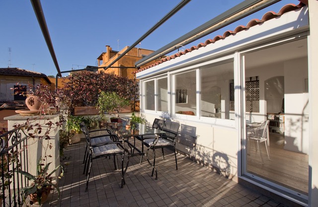 Art lovers attic with terrace