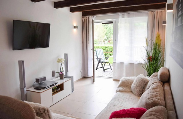 Attractive holiday home in Rowy with fireplace and garden