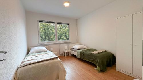 Ausgestattete Wohnungen für Monteur-Teams mit kostenlosem Parkplatz, WIFI, TV, Waschmaschine, Küche, Balkon, Restaurants und Supermarkt
