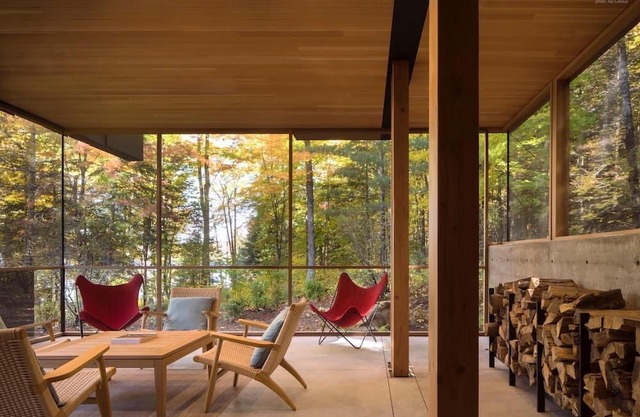 Award-winning lakeside cabin on 99 acres with private trails