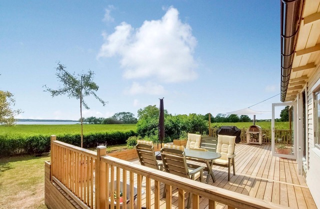 Awesome home in Harlösa with lake view