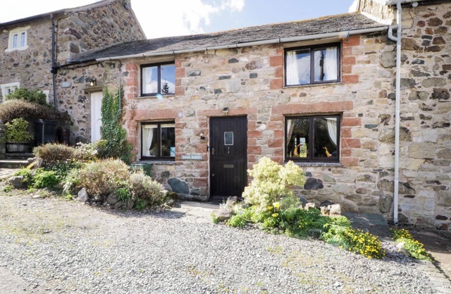 BARN ROOST, pet friendly, with open fire in Ireby